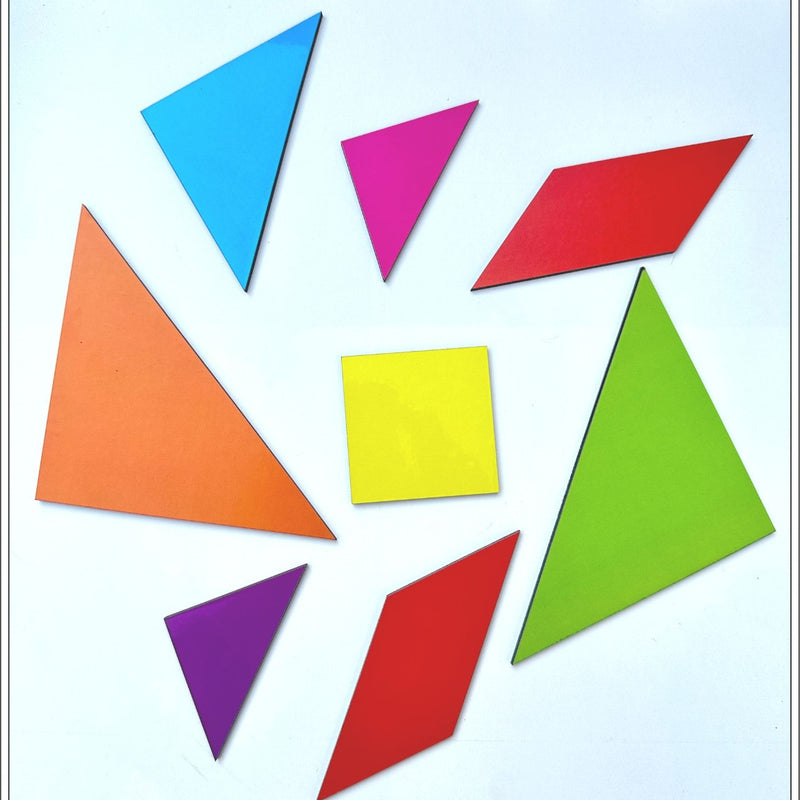 Set of colorful geometric shapes on a light blue background