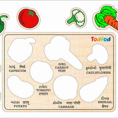 Wooden puzzle with vegetable shapes and labels on a beige background, featuring the brand 'Todfed'.