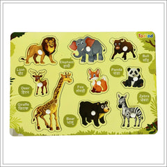 Children's puzzle with animal illustrations and labels on a green background