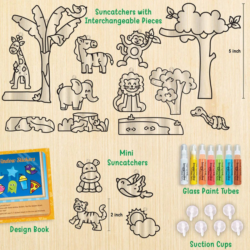 Collection of suncatchers with interchangeable pieces, mini suncatchers, glass paint tubes, and other craft items on a wooden surface.
