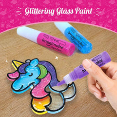 Imagimake glittering glass paint with a unicorn design on a wooden surface.